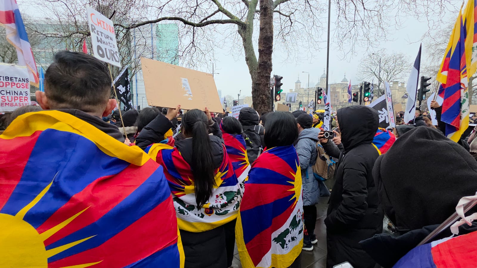 Tibetans gather outside Royal Mint Court (planned embassy site) to protest.