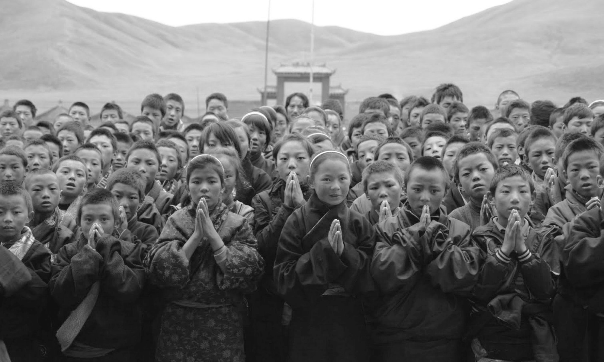 Tibetan children praying.