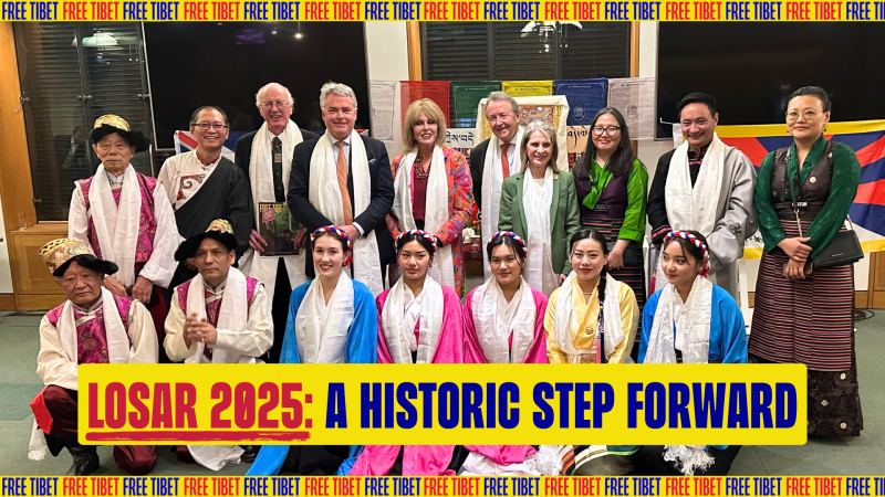 A vibrant group image from Losar in Parliament event in February 2024 of Tibetan campaigners, Tibetan community members, MPs and other friends of Tibet. Ten attendees stand in the background with seven crouched in the foreground, all smiling towards the c